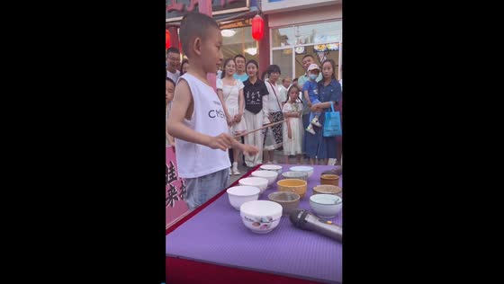 Bowls of melody: young virtuoso creates enchanting music with chopsticks in Gansu Province, China