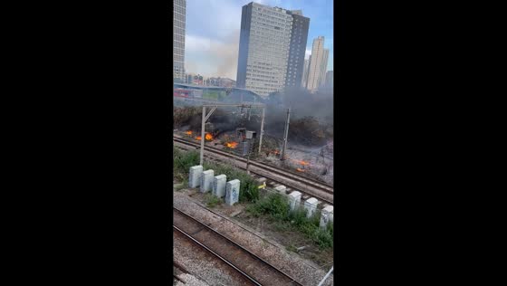 Trackside wildfire forces evacuation near Stratford station in London, UK