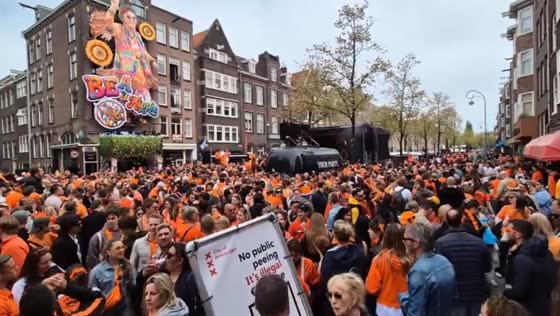 Crowds gather for King’s Day on Westerstraat in Amsterdam, Netherlands