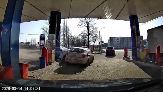 Car swerves and causes crash at gas station in St. Petersburg, Russia