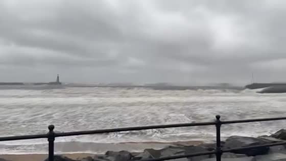 Powerful waves batter Roker Pier during Storm Chandra in Sunderland, England, UK