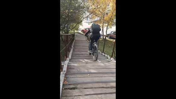 Biker loses control while riding down stairs in Murmansk, Russia