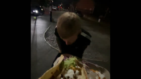 Friends share a laugh as drunk man playfully hits meal in Sheffield