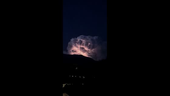 Powerful lightning storm illuminates night sky over Aulla, Italy