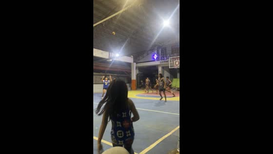 Basketball and volleyball friends play unbothered in Bambang, Philippines