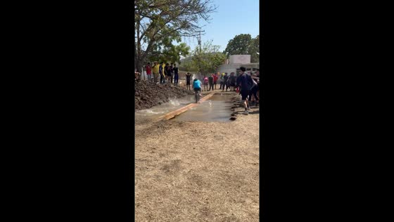 Girl attempts muddy bicycle challenge in Sinaloa, Mexico