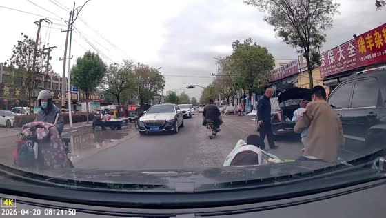 Motorcycle crashes into opened car door in Shandong, China