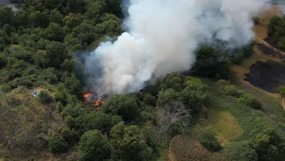 Drone captures wildfire burning through country park in Stoke-on-Trent, Staffordshire, UK