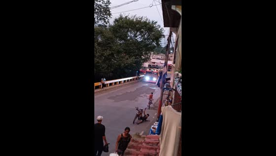 Kid falls from bicycle while attempting to ride without hands in Managua, Nicaragua