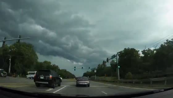 Dark shelf cloud and rain captured in time-lapse during drive in Orland Park, Illinois, USA