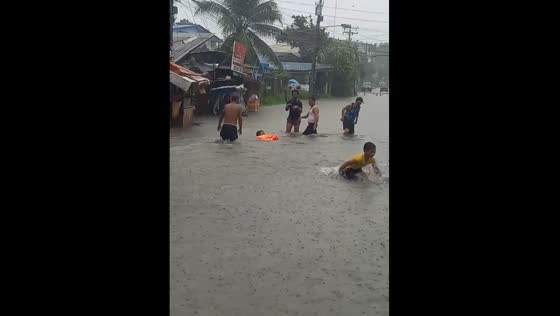 Unusual Christmas Party Game: Who Can Swim the Fastest in the Flood!