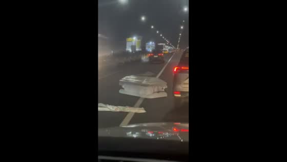 Coffins cause traffic on NLEX highway in Manila, Philippines