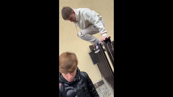 Teen briefly gets foot stuck while jumping off fence in Besana in Brianza, Italy