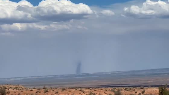 Landspout tornado with debris cloud forms in Utah, USA