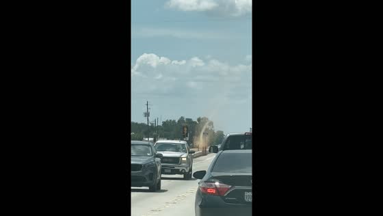 Dust devil captured on video from traffic in Conroe, Texas