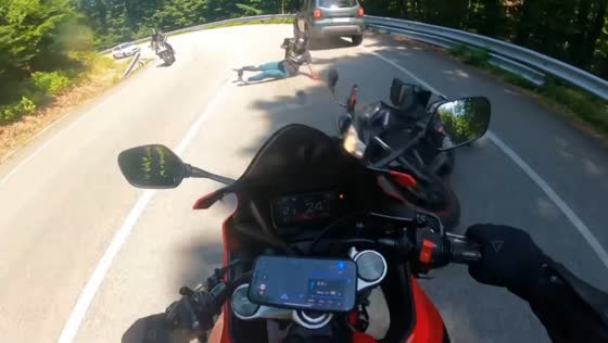 Close motorcycle crash on winding road in Bratislava, Slovakia