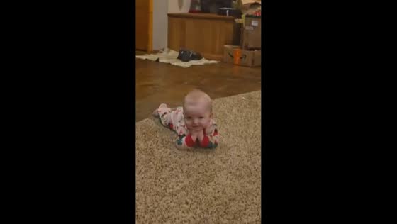 Smiling baby girl charms the camera on Christmas Eve in Montgomery Creek, California, USA