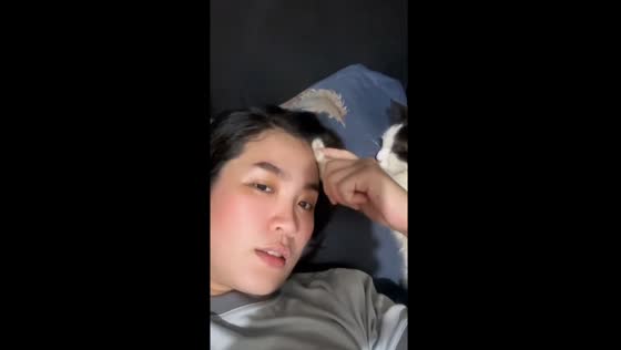 Sweet serenity: a head massage exchange between human and feline in General Santos City