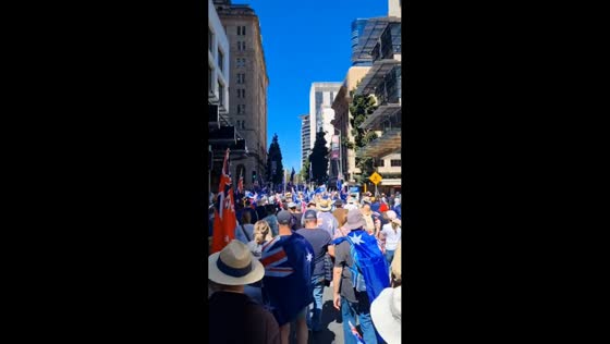 Thousands march peacefully in anti-immigration rally in Brisbane, Australia