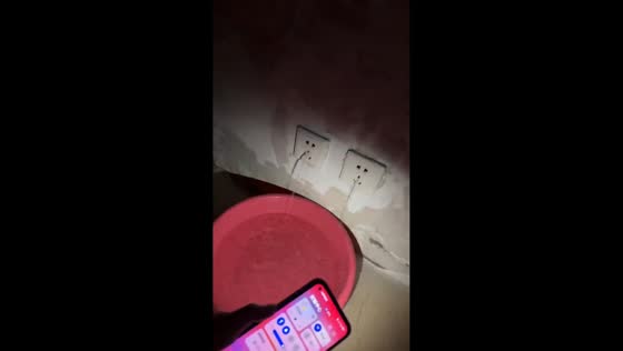Floodwater gushes from wall outlet inside home in Liaoning, China