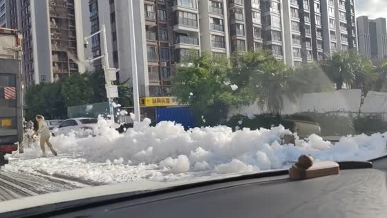 Foam-covered streets after heavy rain in Shantou, Guangdong, China