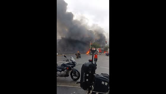 Building engulfed by massive fire in Zhejiang, China
