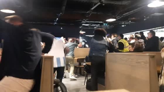 Celebrations erupt after last-minute goal at Dublin Airport pub, Dublin, Ireland
