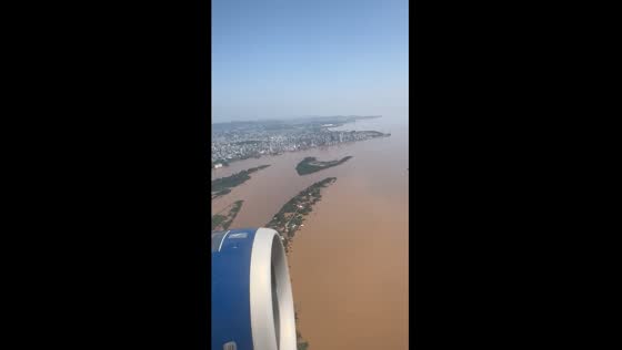 Worst flooding in 80 years: aerial view of Guaíba River engulfing Porto Alegre, Brazil