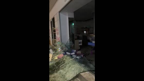 Boutique storefront left shattered after reported looting in Le Marais, France