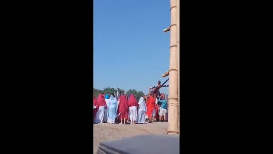Cross falls during Sinakulo performance in Angeles City, Pampanga, Philippines