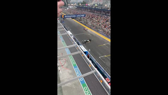 George Russell crashes into pit wall at the end of the first lap in Singapore