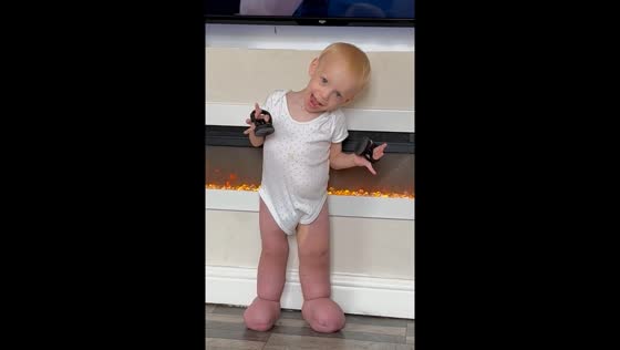 Video shows child singing happily despite disability