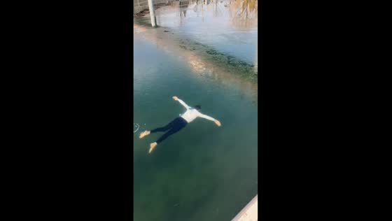 Beijing winter swim: plunge through the ice!