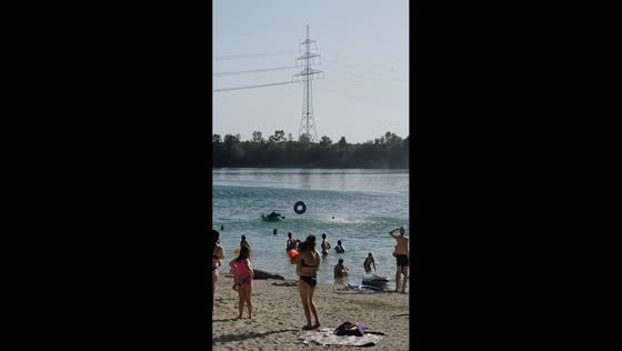 Dust devil sweeps across Echinger See in Munich, Germany