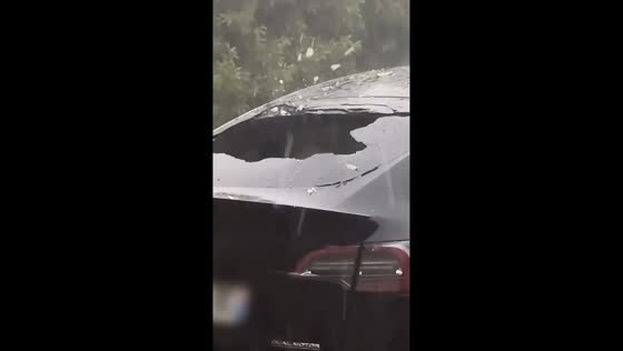 Large hailstones shatter Tesla window during storm in Montfort-Amaury, France