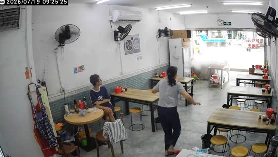 Pressure cooker releases steam at street diner in Guangdong, China