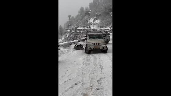 Vehicles skid on slippery road in Kullu, India