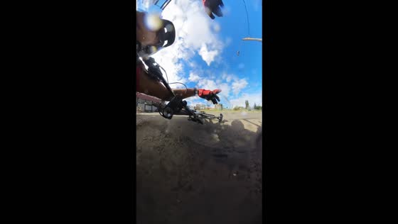 Motorcyclist runs a stop sign and collides with a cyclist in Bogota, Colombia