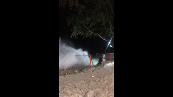 Unexpected waves hit girls at seaside in Glan, Sarangani, Philippines