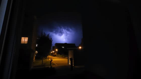 Spectacular lightning illuminates night sky during storm in Switzerland