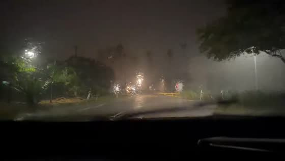 Torrential rain reduces visibility during nighttime drive in St. Petersburg, USA