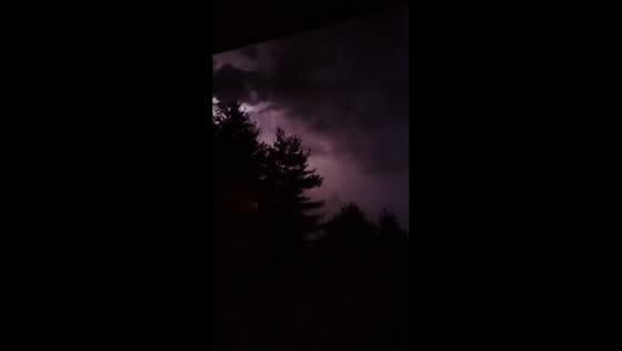 Intense lightning lights up night sky during thunderstorm in Rescaldina, Italy