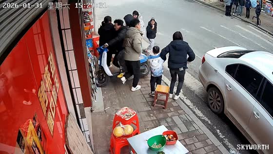 Scooter veers toward pedestrians before crashing into storefront in Chongqing, China
