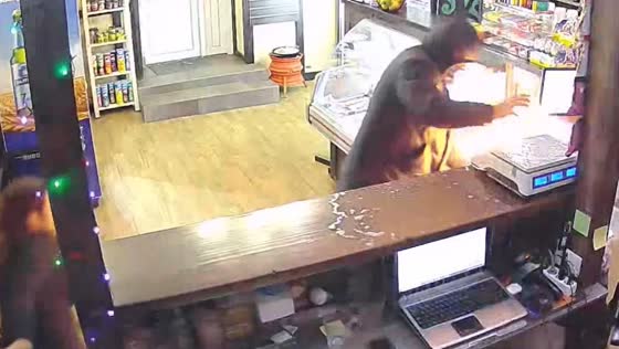Surveillance video shows arsonist setting fire to bar in Cherkessk, Russia
