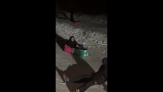 Nighttime snowy hill mishap in Simferopol, Russia 