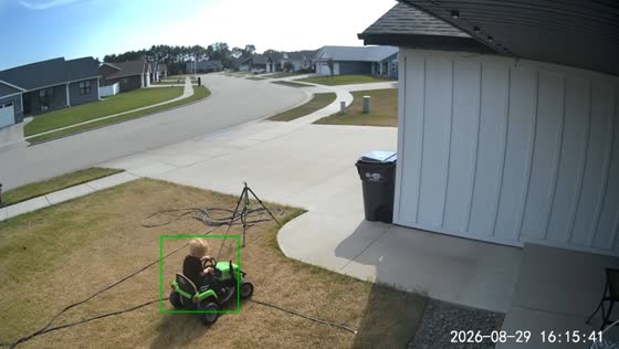 Boy nearly collides with girl while riding battery-powered car in Holmen, USA