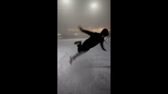 Ice skater attempts trick but trips and falls in Almaty, Kazakhstan