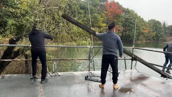 Man falls into pond while walking on a board in Zhejiang, China