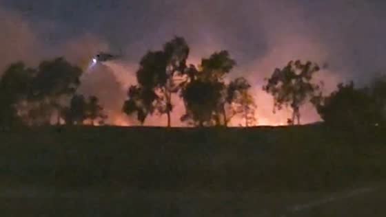 Wildfire seen from Dallas Cowboys training fields in Oxnard, California