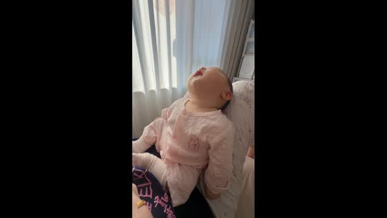 Toddler makes high-pitched hiccup sounds while peacefully asleep in Zhejiang, China